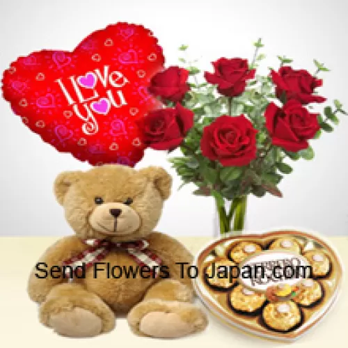 7 rote Rosen mit etwas Farn in einer Glasvase, ein süßer 14 Zoll großer brauner Teddybär, 8 Stück herzförmige Ferrero Rocher und ein "Ich liebe dich" Ballon